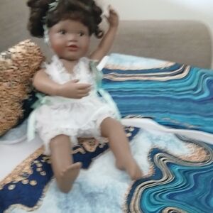 Charming Ceramic Doll with Brown Hair and White Dress